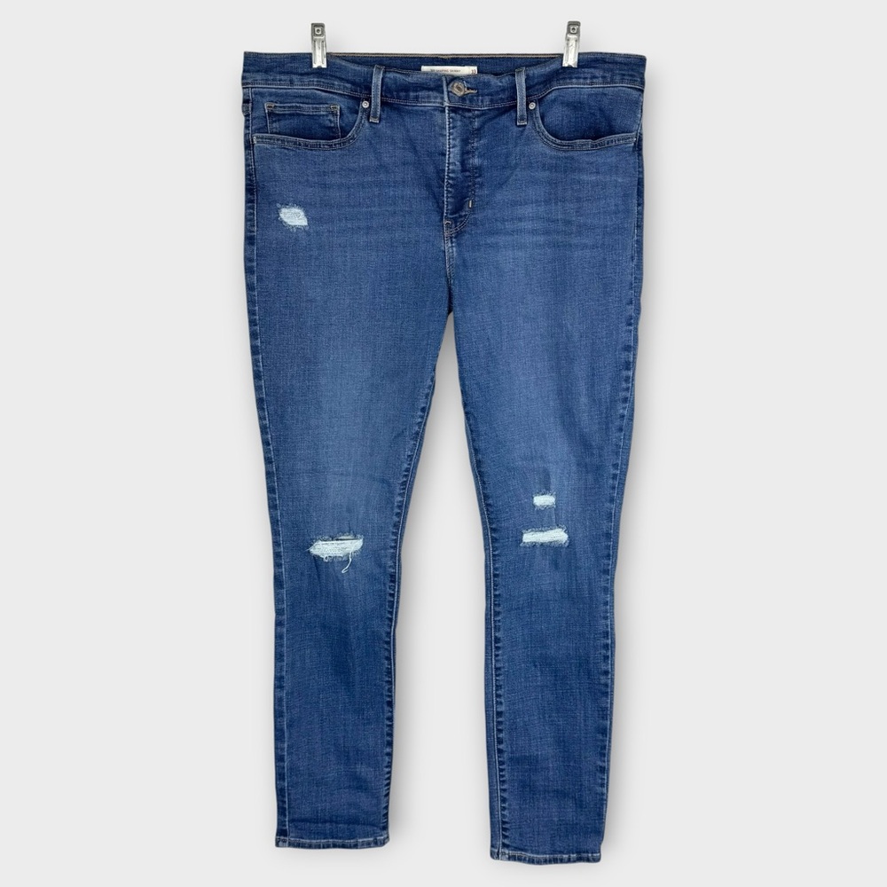 Levi’s 311 shaping skinny jeans 33 mid-rise stretch denim dark wash distressed